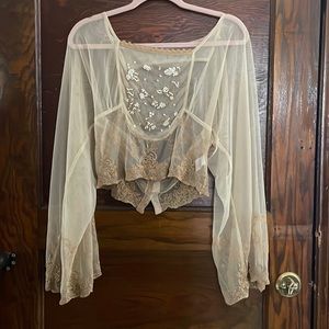 Free People sheer embroidered top size medium.
